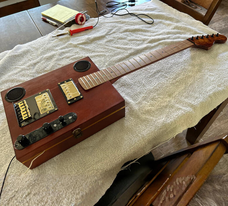 A photo of a Cigar Box Guitar created by Ray Riordan