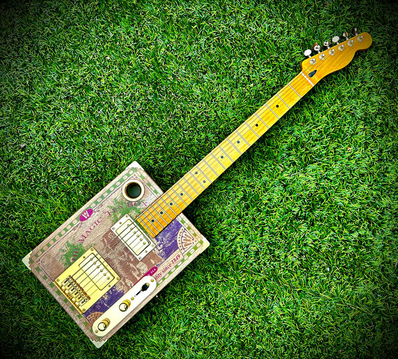 A photo of a Cigar Box Guitar created by Ray Riordan