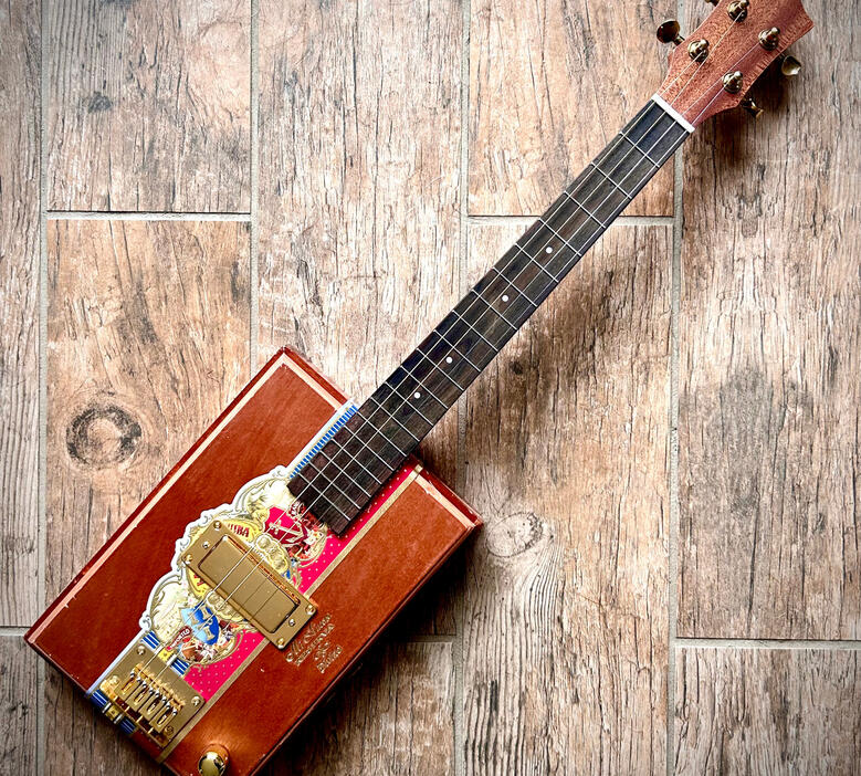 A photo of a Cigar Box Uke created by Ray Riordan