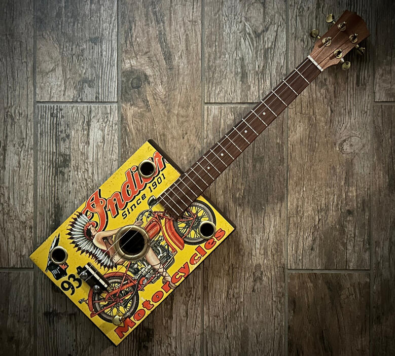 A photo of a Cigar Box Uke created by Ray Riordan