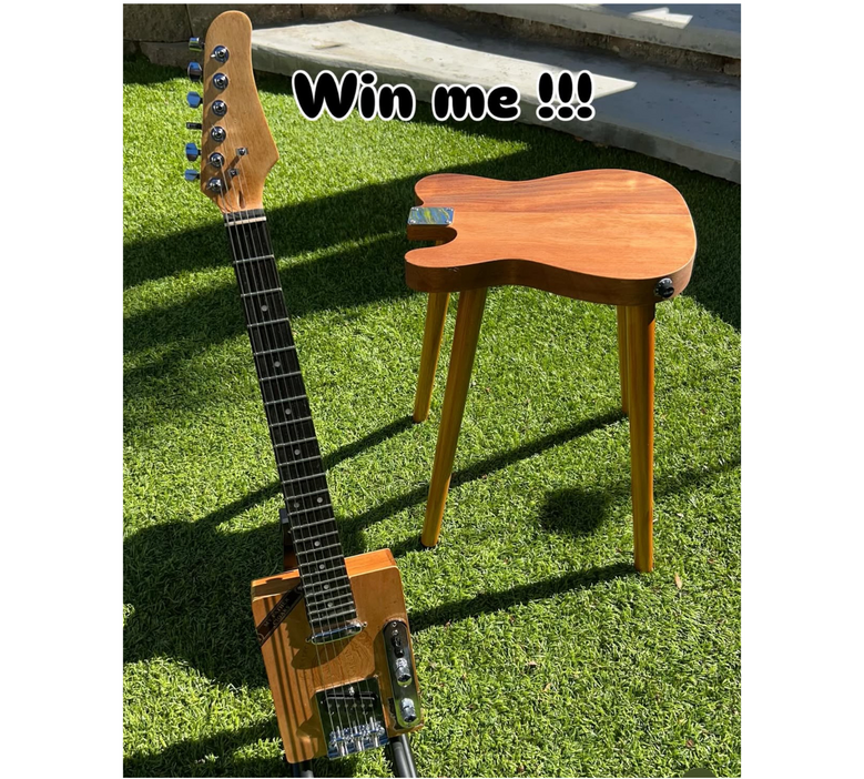 A photo of a Cigar Box Guitar and a guitar tables created by Ray Riordan
